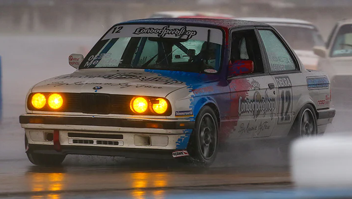 Spec E30 BMW on the track.
